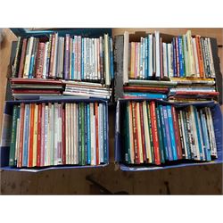 Four Boxes of Books on Trams and Buses