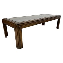 Hardwood framed coffee table, rectangular form with cane top and inset glass, on moulded supports 