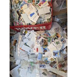 Great British and World stamps, mostly loose on pieces, including GB Queen Elizabeth II, Germany, Nigeria, Netherlands, South Africa etc, in four boxes