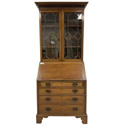 George III mahogany bureau bookcase, projecting dentil cornice and turned pear-drop moulding, two astragal glazed doors over fall-front concealing fitted interior with four graduating cock-beaded drawers below, on bracket feet