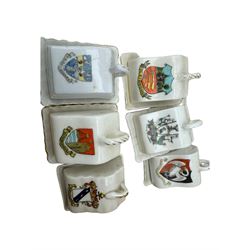 Collection of crested ware miniature cheese dishes and covers, including one by Goss, in one box