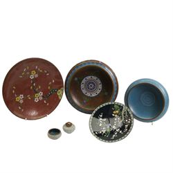 Chinese cloisonne bowl with inverted rim, decorated with geometric and floral design against a burnt orange ground, D21cm, a similar blue ground bowl, pepper pot and open salt, Japanese Inaba style cloisonne plate, decorated with an exotic bird amongst prunus, against a black ground, D15cm and another cloisonne dish (6)