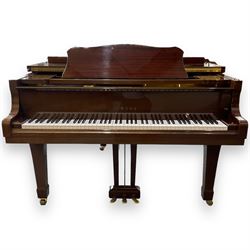 Yamaha - Baby Grand piano in mahogany polyester finish case,  G1 model, serial No 4741647, cast overstrung frame with 88 keys and seven octave compass, original stringing, tuning pins, hammers, dampers and felts, sostenuto, una corda and sustain pedals, with a solid music desk and tapered legs on brass castors.   