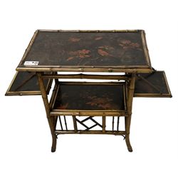 Late 19th century Aesthetic Movement lacquered and painted bamboo occasional table, rectangular top painted with Japanned traditional bird and blossom scenes, over two fold-out side leaves and undertier with pierced gallery apron