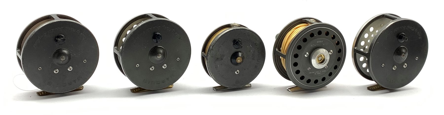 DS Five Hardy fly fishing reels comprising 'J.L.H. Salmon No669 Made by  House of Hardy England', 'Marquis #8/9 Made by Hardy Bros Ltd England' and  three 'Marquis Salmon No2 Made by Hardy