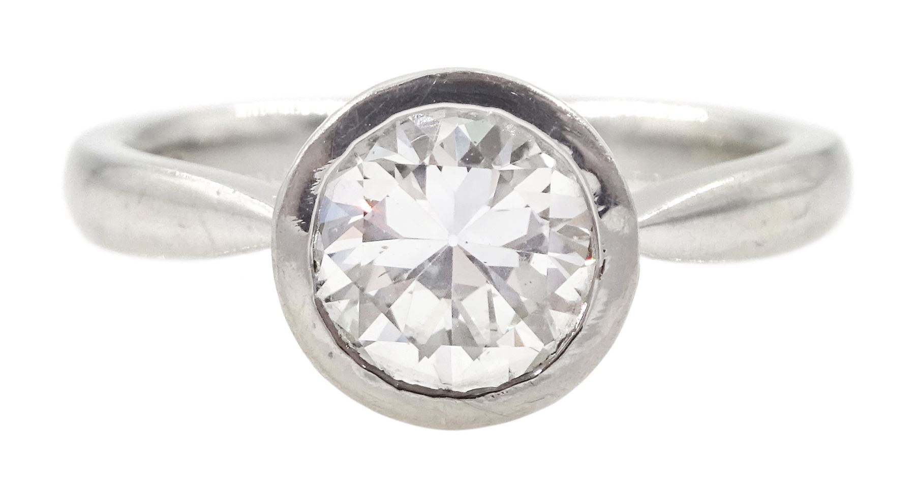 Platinum bezel set round brilliant cut diamond, single stone ring ...
