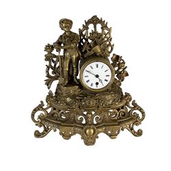 19th century - French gilt spelter 8-day timepiece mantle clock, with an ornate rococo case on splayed feet, drum movement with a cast figure of a gardener, flowers and gardening tools, white enamel dial with Roman numerals, minute markers and matching steel moon hands. With pendulum.   