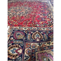 Large Persian Mashad red ground with all over floral field centred by lozenge medallion 377 x 277