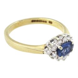 9ct gold oval sapphire and round brilliant cut diamond cluster ring, hallmarked London 1994, sapphire approx 0.55 carat, total diamond weight approx 0.25 carat