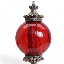 Vintage pierced brass table lamp in the form of an oil lamp, with red glass shade, H61cm