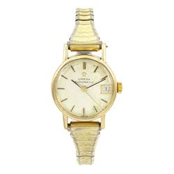 Omega ladies 9ct gold automatic presentation wristwatch, Cal. 681, silvered dial with baton hour markers and date aperture, London 1966, on expanding stainless steel bracelet