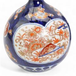 Pair of Japanese Imari bottle vases, H22cm