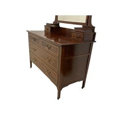 Edwardian mahogany dressing table, raised arch mirror with bevelled plate over trinket drawers, moulded rectangular top with satinwood band, two short of two long drawers, on square supports with brass cups and castors 