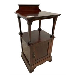 Edwardian inlaid mahogany two-tier bedside cabinet, raised back, decorated with ebony and boxwood feathered stringing, panelled cupboard fitted to base, on splayed bracket feet