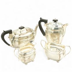 Silver four piece tea set comprising tea pot, hot water jug, milk jug and two handled sugar bowl of panel sided design, the tea pot and hot water jug with ebonised handles and lifts, jug is Chester 1939 and the others Birmingham 1938/9, all by Blanckensee & Son Ltd