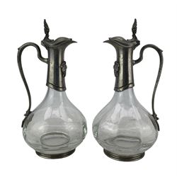 Pair of French glass and pewter mounted claret jugs, each with grapevine relief decoration, by Etain, H28cm 