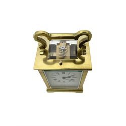 French - early 20th century carriage clock in a Anglaise case with four bevelled glass panels, with a twin train rack striking movement and repeat work, striking and repeating the hours and half hours on a coiled gong, enamel dial with Roman numerals, minute markers and steel spade hands, 8-day duration with a jewelled lever platform escapement and key.