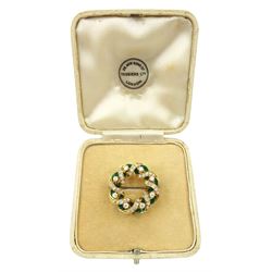 Early 20th century old cut diamond and green enamel circular ribbon brooch, total diamond weight approx 1.35 carat