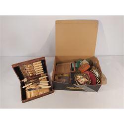 Box of Cutlery and Small Pictures