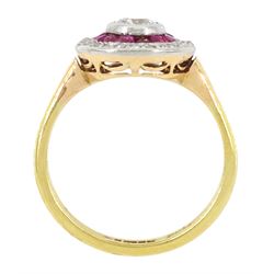 18ct gold calibre cut ruby and diamond target cluster ring, the central diamond with ruby and rose cut diamond surround, Sheffield 1982, principal diamond approx 0.25 carat