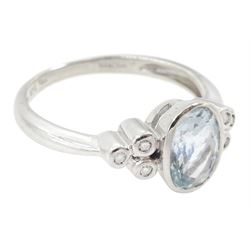 9ct white gold oval aquamarine and round brilliant cut diamond ring, hallmarked