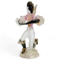 Pair of Murano figural glass Blackamoor candlesticks, each kneeling supporting the single sconce, on domed circular bases with aventurine inclusions, H31cm, together with a matching bowl, L22.5cm (3)