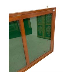 Late 20th century mahogany framed wall hanging display notice board, enclosed single door fitted with three glazed panels, green baize lined interior 