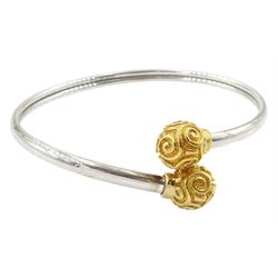 9ct white gold bangle with yellow gold ball finials with swirl decoration, hallmarked