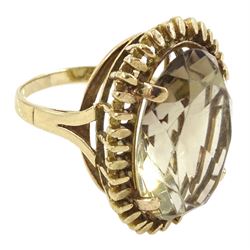 9ct gold oval cut smoky quartz ring, in a fancy textured claw setting, London 1977