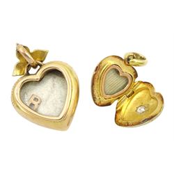 Victorian gold single stone old cut diamond, hinged locket heart pendant, stamped 15 and one other Victorian 15ct gold green enamel heart pendant, with white enamel border, applied gold pearl decoration and split pearl leaf bail, the reverse with glazed locket and engraved 21st June 1899