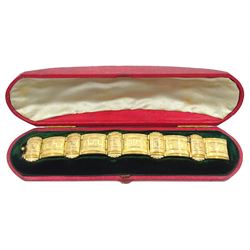 Victorian gilt fancy link bracelet, with Greek Key decoration, in a fitted case