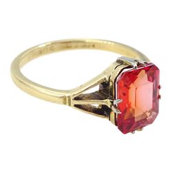 9ct gold single stone emerald cut red-orange sapphire ring, with forked shoulders