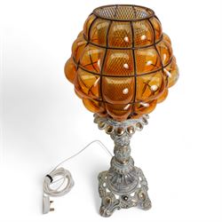 Vintage pierced brass table lamp in the form of an oil lamp, with amber glass shade, H62cm