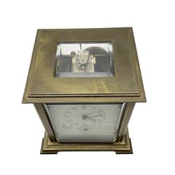 French - 20th century 8-day brass cased table clock, with five bevelled glass panels and multi-dial recording the time, date ,day, month and phases of the moon, with a twin train rack striking movement and platform lever escapement, striking the hours and half hours on a bell.