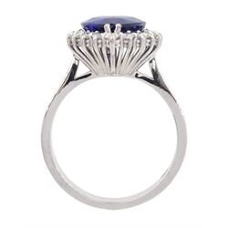 18ct white gold pear cut sapphire and round brilliant cut diamond cluster ring, hallmarked, sapphire approx 3.65 carat, total diamond weight approx 0.50 carat