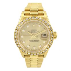 Rolex Oyster perpetual Datejust ladies 18ct gold automatic wristwatch, circa 1995, Ref. 69178, serial No. W687714, champagne dial with diamond hour markers, aftermarket diamond bezel and original gold bezel, on 18ct gold Rolex president bracelet with fold-over clasp, hallmarked, boxed with service guarantees