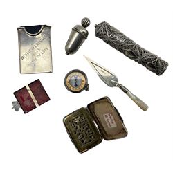 Group of silver novelties/small collectables, comprising Georgian vinaigrette, Victorian silver needle case, Edwardian silver tape holder in the form of an acorn, 1920's Scottish silver and mother of pearl page marker, Edwardian silver mounted compass pendant, late Victorian silver miniature frame, and a small unmarked silver filigree case