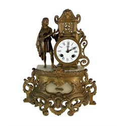 French - late 19th century 8-day mantle clock with two matching five light candelabra, gilt spelter case with alabaster panels and plinth, drum movement and standing figure from classical antiquity, enamel dial with Roman numerals, minute markers and steel hands, with a twin train countwheel striking movement striking the hours and half-hours on a bell. With pendulum. 