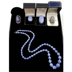 Two silver blue laced agate rings, two filigree set faceted agate rings, all stamped 925 and a blue bead necklace (5)
