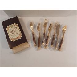 Collection of Boxed Bronze and Rosewood Cutlery
