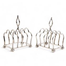 Pair of six division silver toast racks with Gothic loop handles on compressed bun feet, each L8cm Sheffield 1918/19 Maker James Dixon & Sons