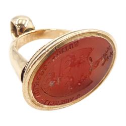 Large 19th century gold oval carnelian intaglio fob seal depicting three stags within a shield and mounted by a stag's head, engraved with the moto 'Virescit Vulnere Virtus'