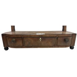 George III mahogany toilet mirror, rectangular plate on ring turned supports with swing action, three drawers with simulated ivory escutcheon, on ebonised bun feet