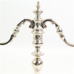 Pair of 18th century design silver two branch candelabra with baluster stems on dished circular foot H24cm London 1965 Maker Solomon Joel Phillips (S J Phillips)