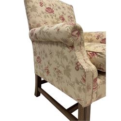 Peter Dudgeon - Georgian design mahogany framed armchair, shaped cresting rail over sprung back and seat flanked by rolled arms, upholstered in floral patterned fabric with matching seat cushion, on square supports joined by stretchers
Provenance: From the Estate of the late Dowager Lady St Oswald