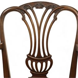 Georgian mahogany open armchair,pierced vase shaped splat carved curled leafage, serpentine tan leather studded seat