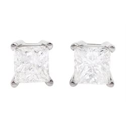 Pair of white gold princess cut diamond stud earrings, total diamond weight 1.00 carat, with World Gemological Institute report