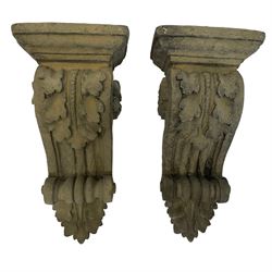 Pair of Victorian design cast stone architectural corbel wall brackets, stepped rectangular top over a scrolled bracket with relief acanthus leaf decoration and rosette motifs to the side