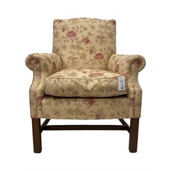 Peter Dudgeon - Georgian design mahogany framed armchair, shaped cresting rail over sprung back and seat flanked by rolled arms, upholstered in floral patterned fabric with matching seat cushion, on square supports joined by stretchers
Provenance: From the Estate of the late Dowager Lady St Oswald