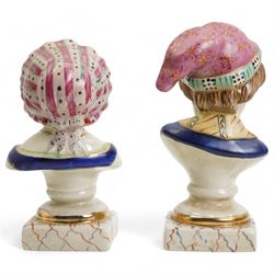 Pair of Staffordshire style busts of a young girl an boy, each upon square marbled bases, H22cm